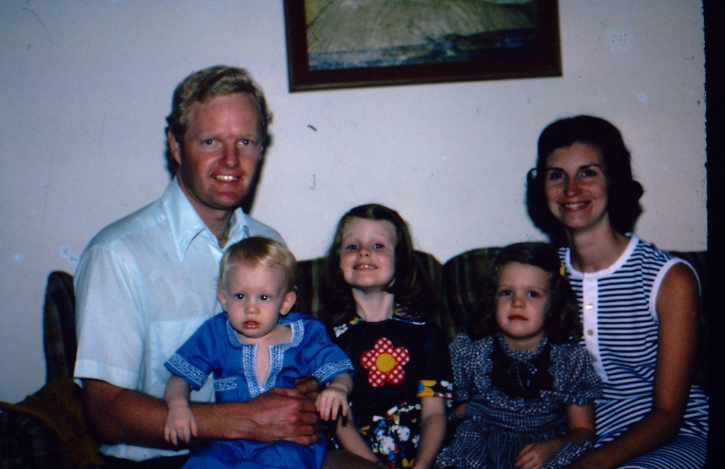 Click to enlarge Clay Routledge (in blue) with family