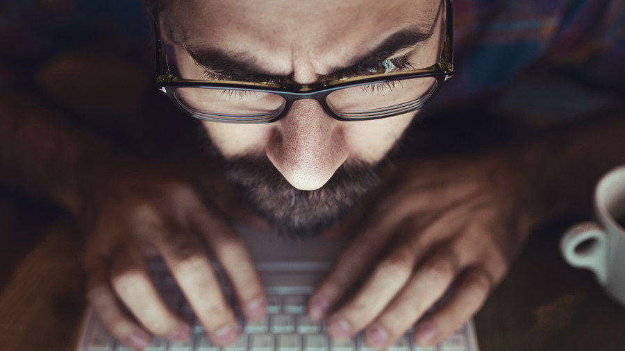 Click to enlarge man on computer