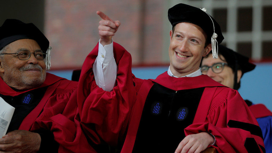 Click to enlarge Facebook CEO Mark Zuckerberg pointing and laughing