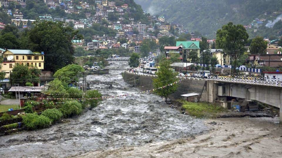 A swollen Beas river flows after heavy rains
