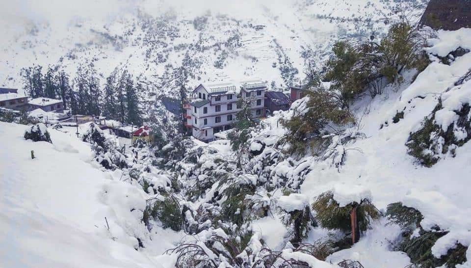 A view of a snow-covered hills, at Keylong