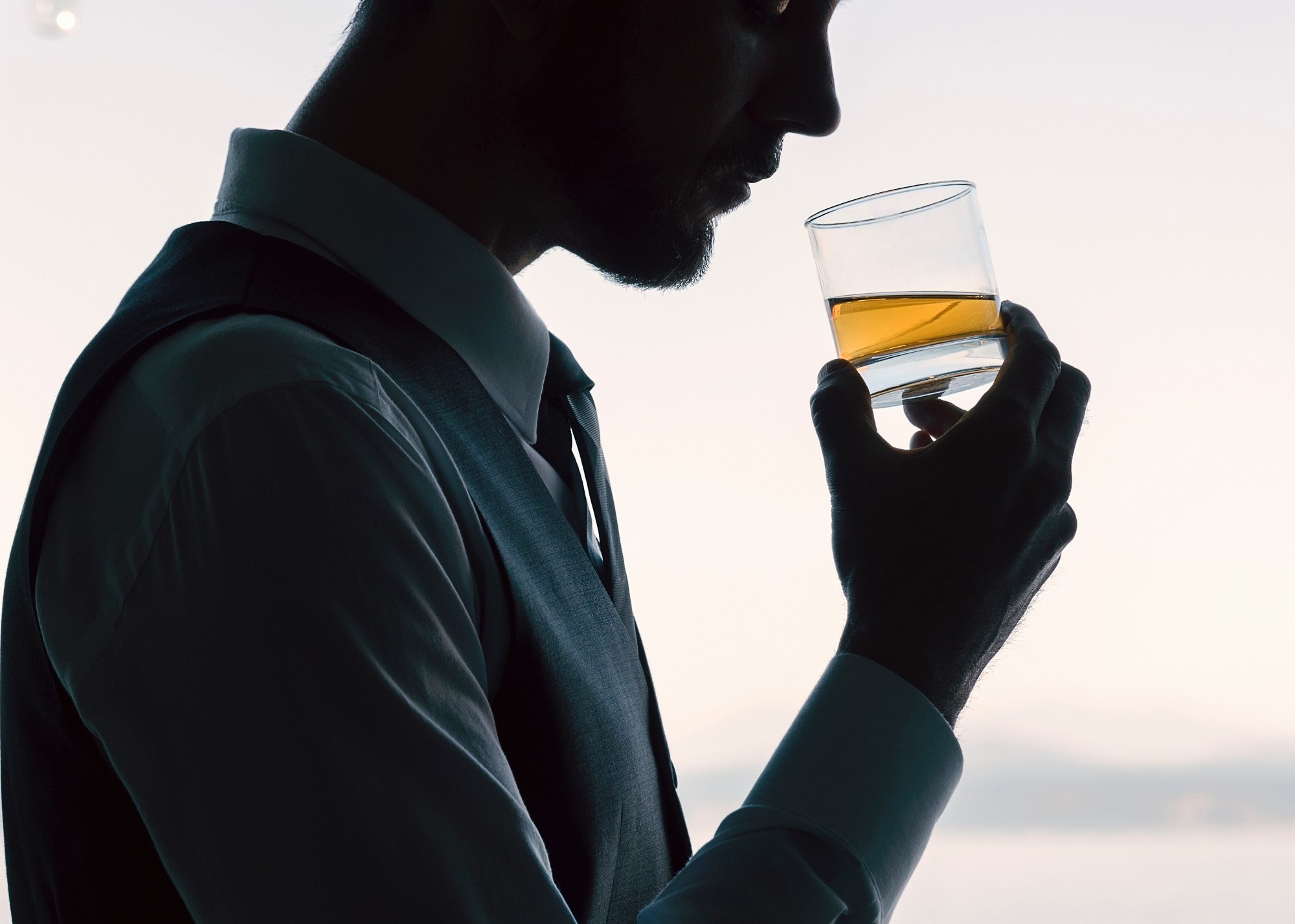 Click to enlarge man drinking booze alcohol