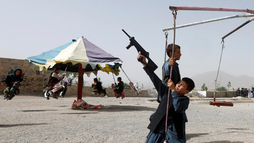 Afghan child with gun