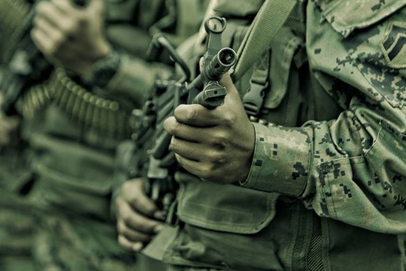 soldier machine gun violence
