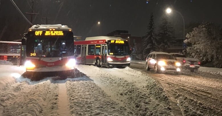 Two buses blocked the eastbound lanes of Memorial shortly before 7 a.m.