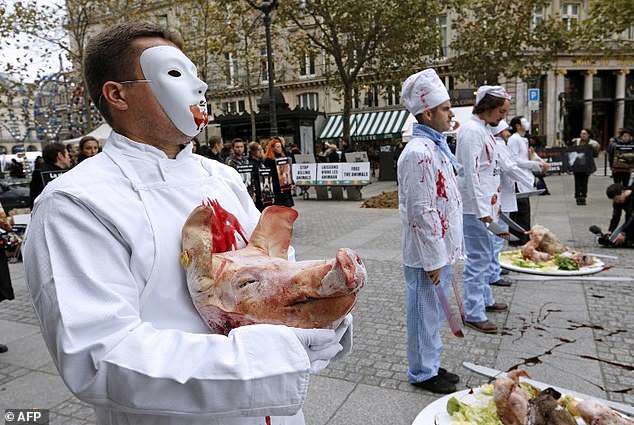 Members of animal rights group'Vegan 269 Life France' during a protest against cruelty to animals in Paris