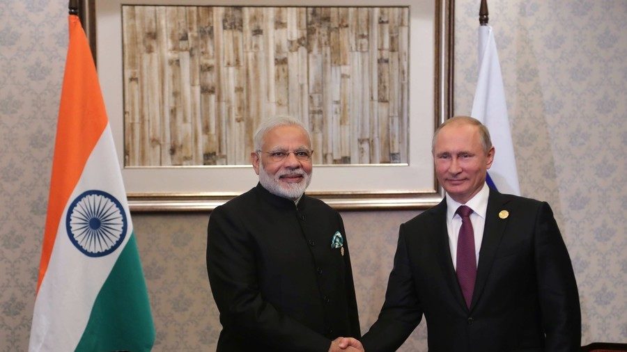 Click to enlarge Vladimir Putin and Narendra Modi