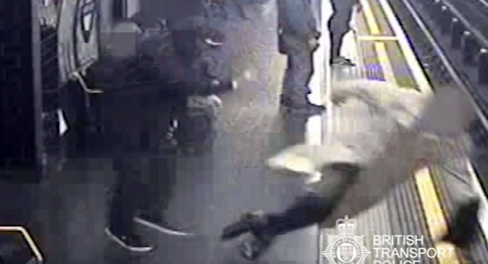 man push train platform