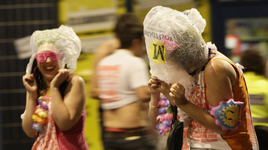 Click to enlarge Students with bags on their heads