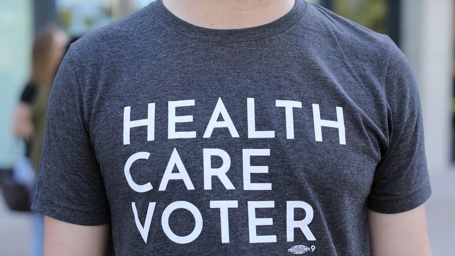 Click to enlarge health care protester