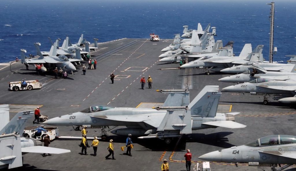 The only fixed wing aircraft that operate from U.S. Navy aircraft carrier, F/A-18 Hornet, F/A-18E Super Hornet, E-2C and E2-D Hawkeye AEW&C aircraft.