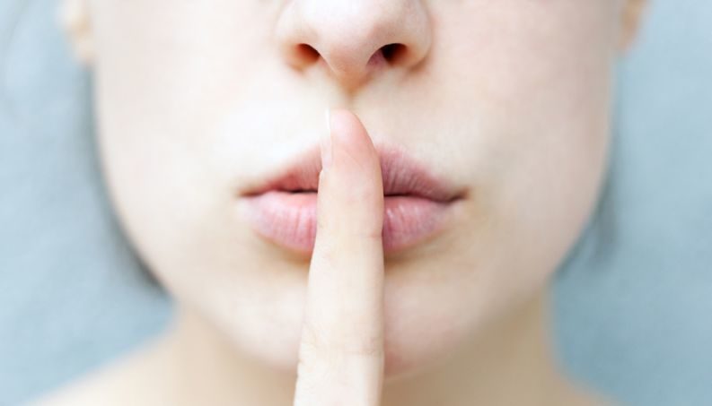 woman silenced