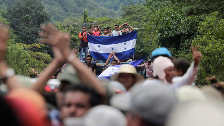 Click to enlarge Honduran migrants