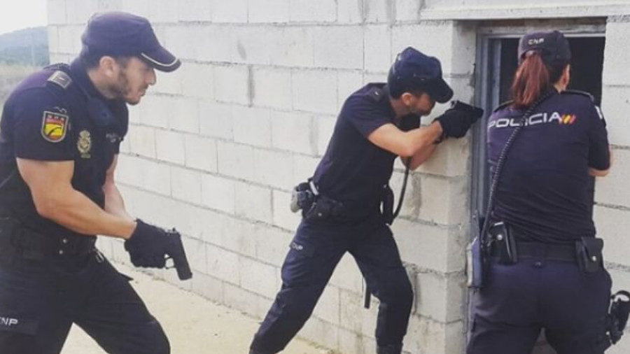 Click to enlarge spanish police