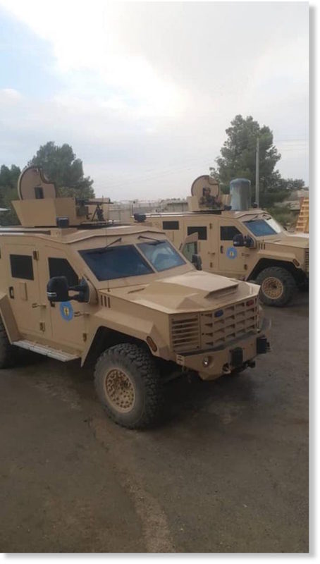 Click to enlarge Armored vehicles in Syria's Manbij 2