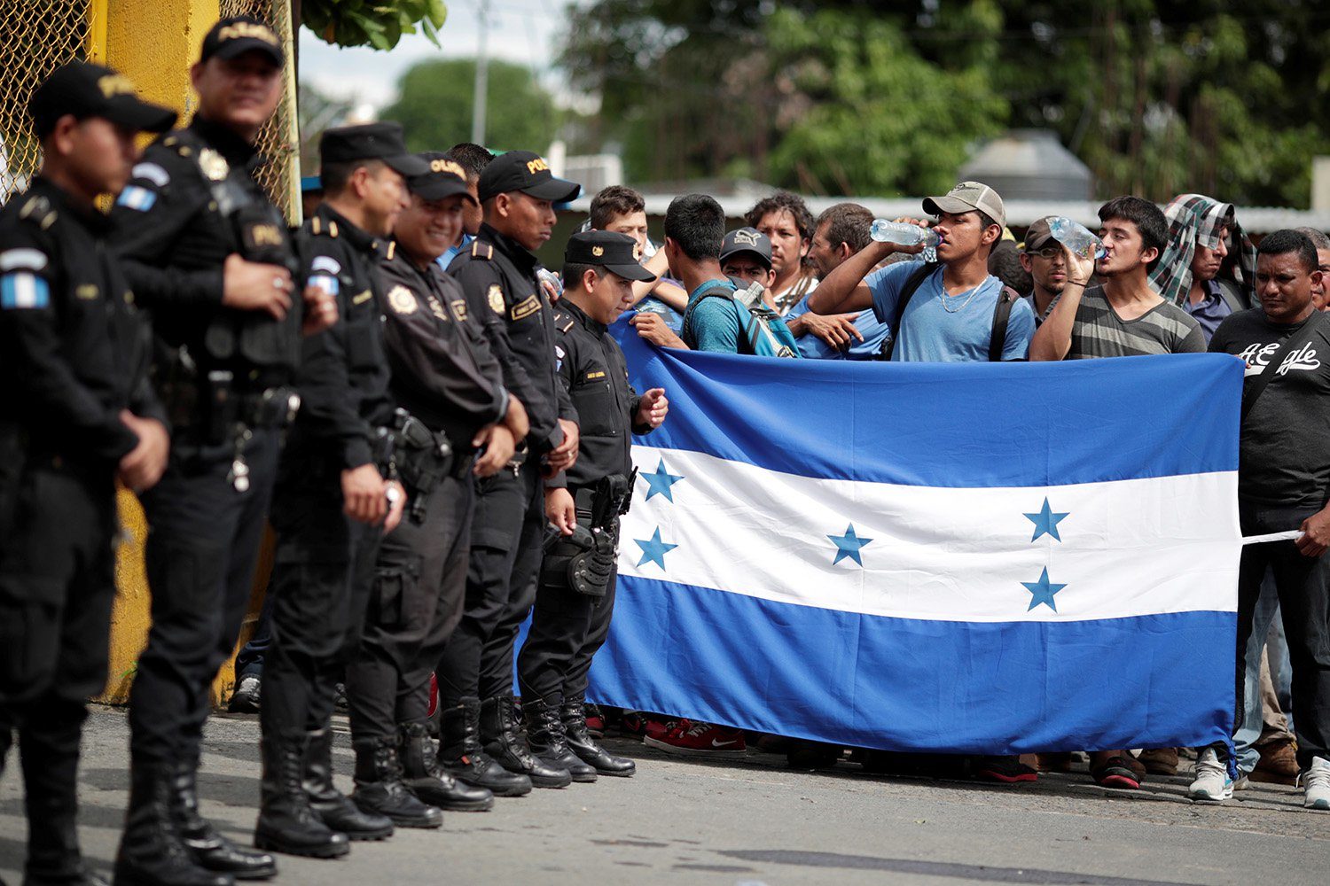Click to enlarge Honduran migrants