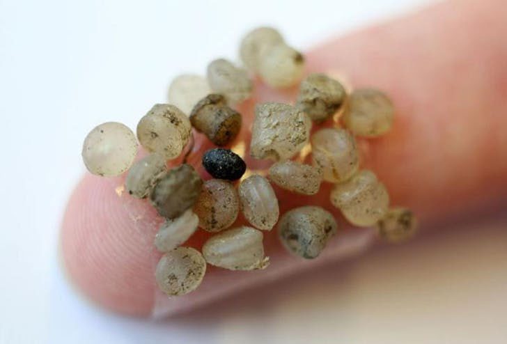 Click to enlarge microplastics finger