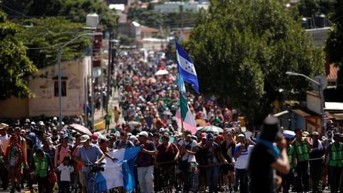 Click to enlarge migrant caravan