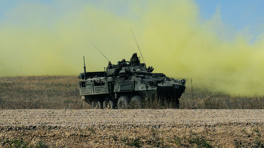 FILE PHOTO: A Canadian army Light Armoured Vehicle (LAV III) reacts to simulated chlorine gas as part of a training scenario during Operation Maple Resolve 2015 in Wainwright, Alberta, Canada