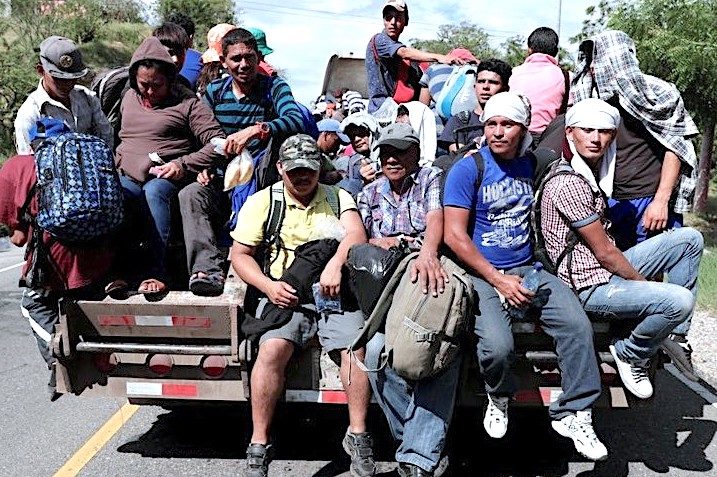 Click to enlarge Migrants truck