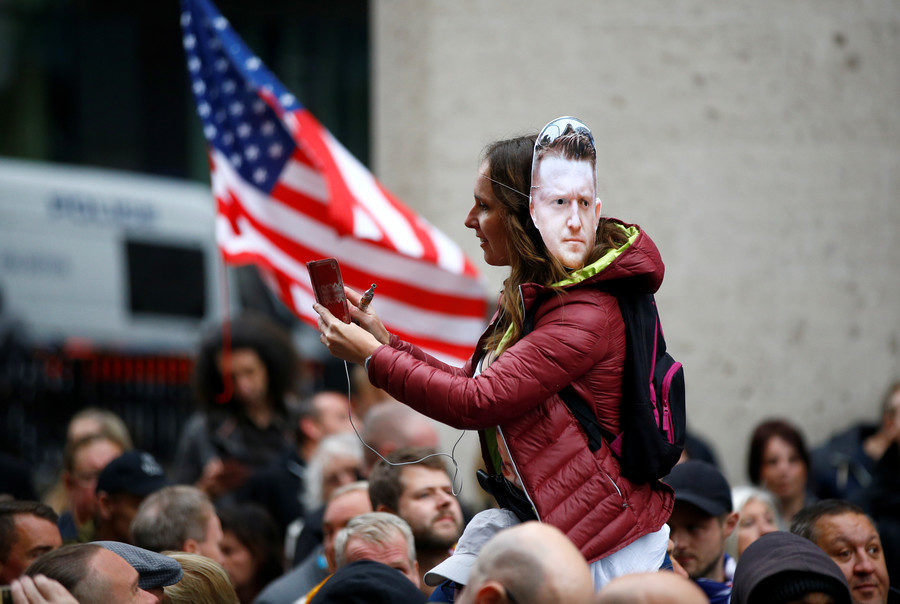 Click to enlarge protester in front of american flag