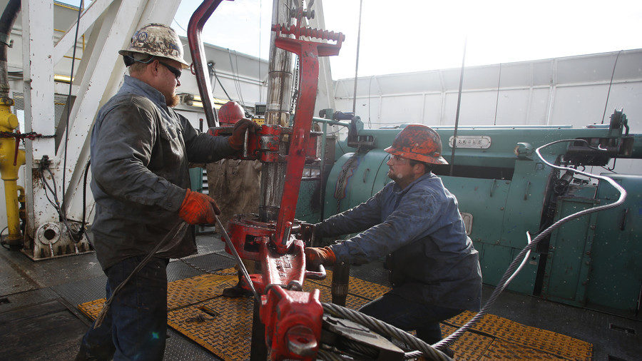 Click to enlarge Oil workers