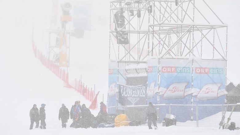 Austrian soldiers take down the finish line banner