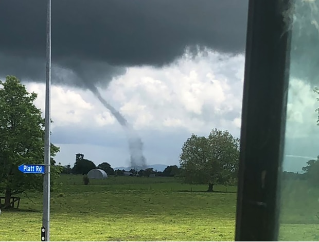 Sam Owen, who lives at Eureka, was heading west along State Highway 26 in his tractor when he spotted a strange cloud formation in the distance.