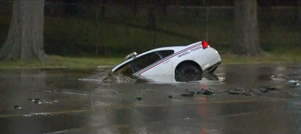 A sinkhole swallows up a TTC vehicle near the Port Lands.