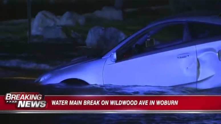 Sinkhole swallows car in Woburn