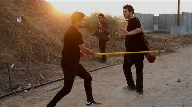 Click to enlarge Israeli settler (L) confronts a peace activist protest Gaza Strip October 5 2018