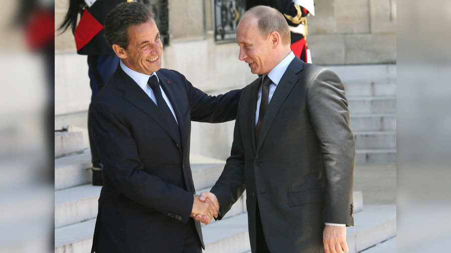 Click to enlarge Then French President Nicolas Sarkozy (L) meets Vladimir Putin at the Elysee Palace in Paris in 2010.