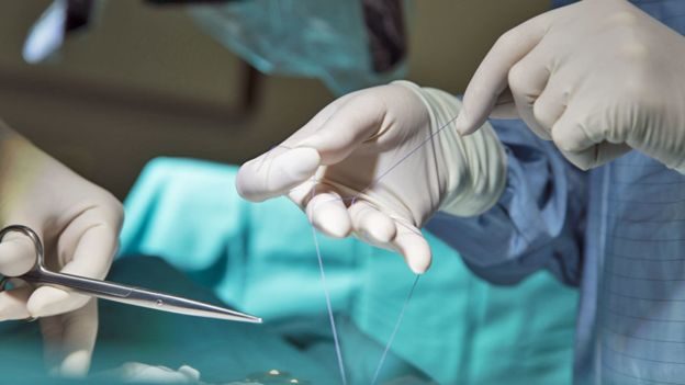 surgeon operate stitch
