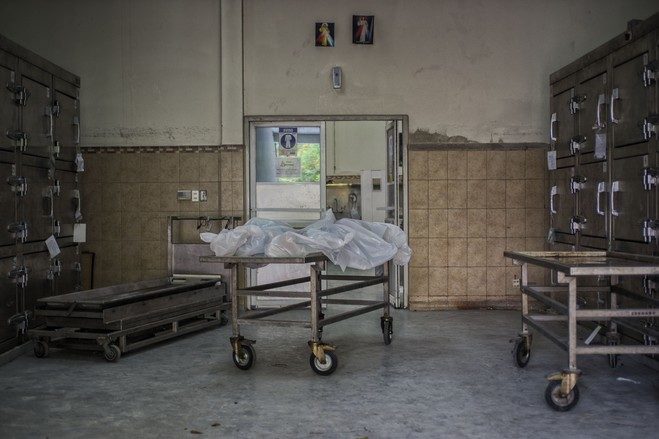 Click to enlarge Two bodies await an autopsy