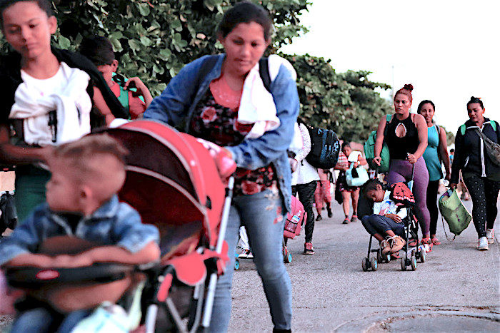 Click to enlarge migrants
