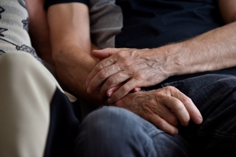 Click to enlarge hand holding