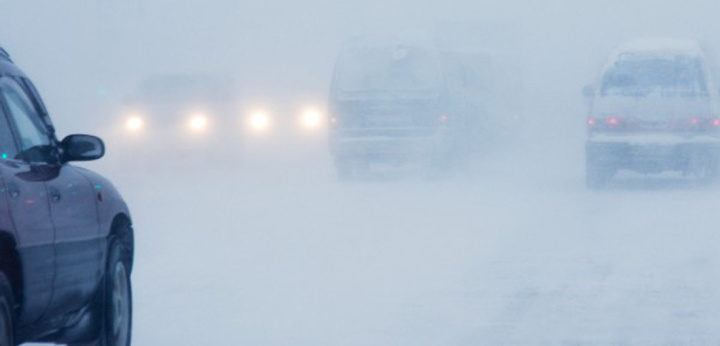 blizzard cars driving snow