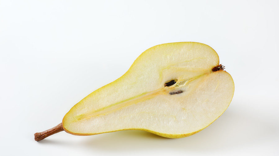 Click to enlarge Woman finds needle in pear
