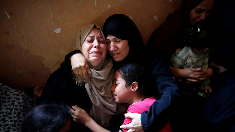 Click to enlarge Relatives of Palestinian Mohammed Abbas