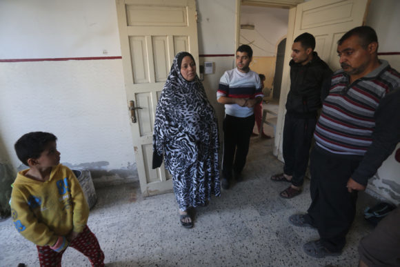 Click to enlarge Suhair Habboush (center) in her apartment near the al-Amal HotelNovember 13 2018.