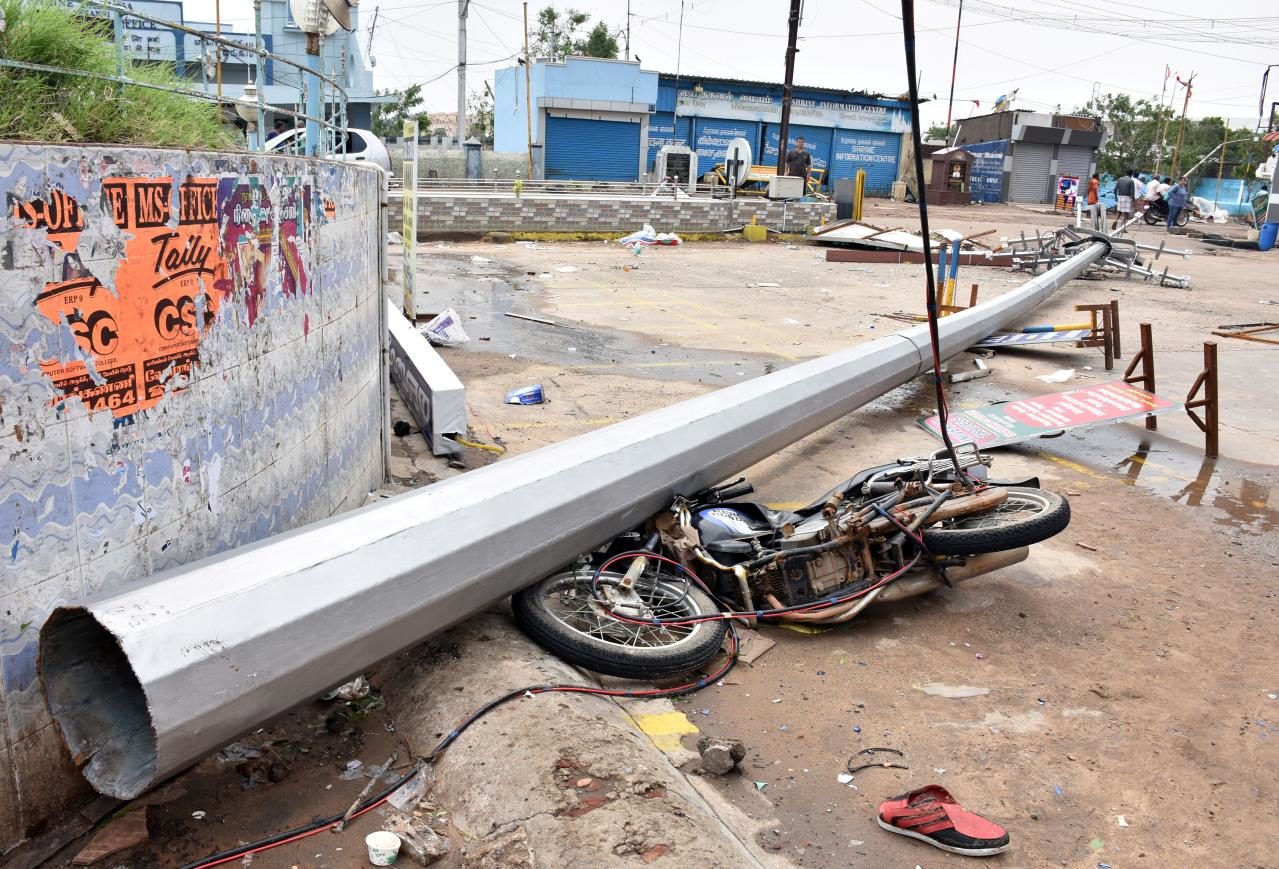 A fallen pole and a damaged motorbike are seen in a road after cyclone Gaja hit Velankanni, in Nagapattinam district in the southern state of Tamil Nadu, India, November 16, 2018.