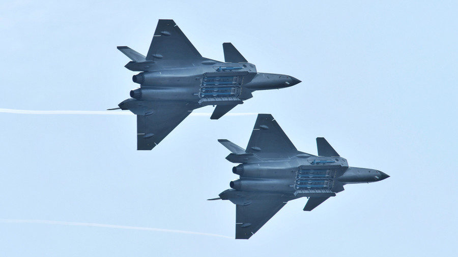 Click to enlarge Chengdu J-20 stealth fighter jets with open weapon bays during the Zhuhai Airshow