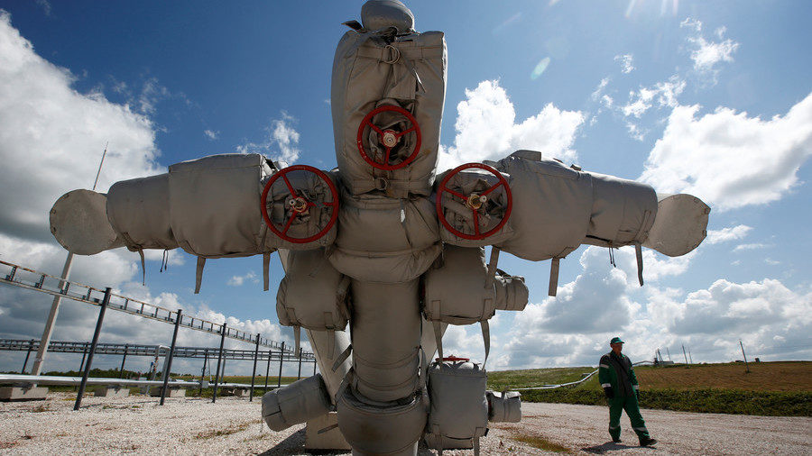 Click to enlarge An employee works on highly viscous oil production at the Ashalchinskoye oil field in Russia