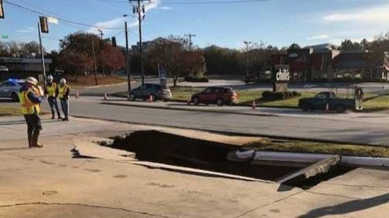 Click to enlarge sinkhole greenvillea day ago Sinkhole opens in Greenville, SC,