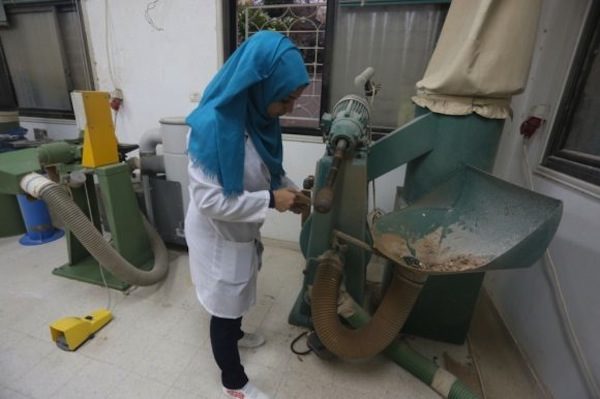 Click to enlarge Technician at the Artificial Limbs and Polio Center