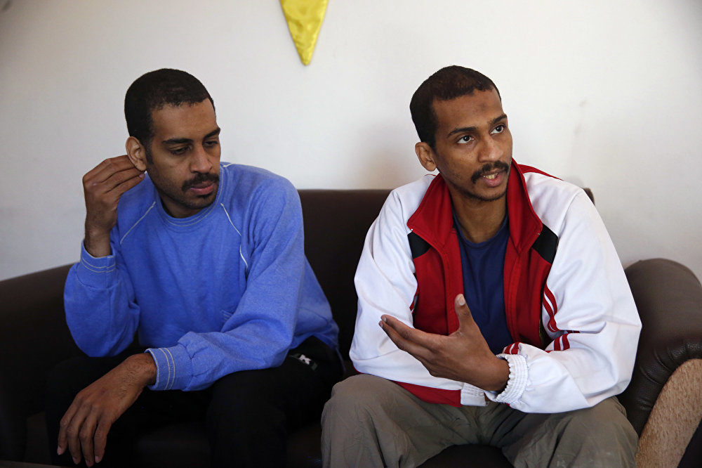 Click to enlarge Alexanda Amon Kotey, left, and El Shafee Elsheikh