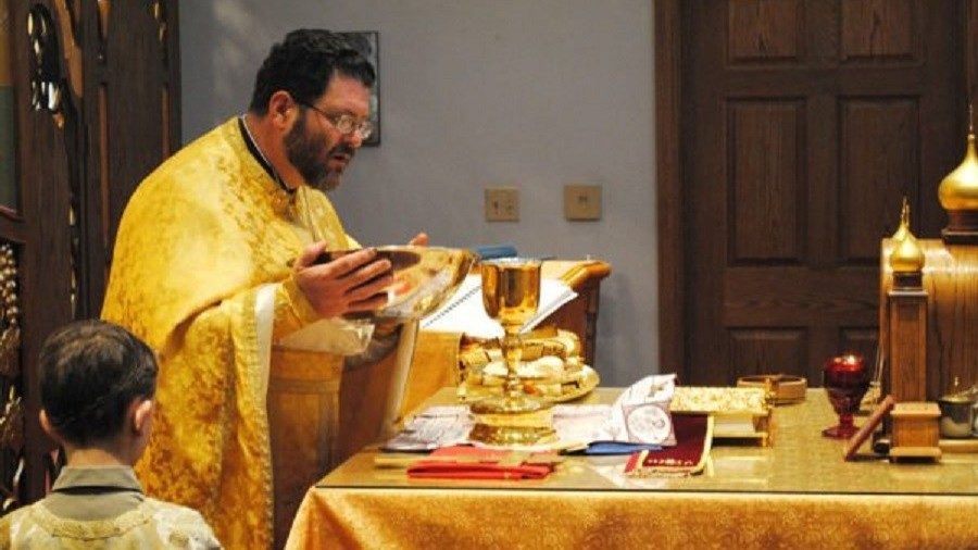 Click to enlarge Orthodox priest, Mark Tyson