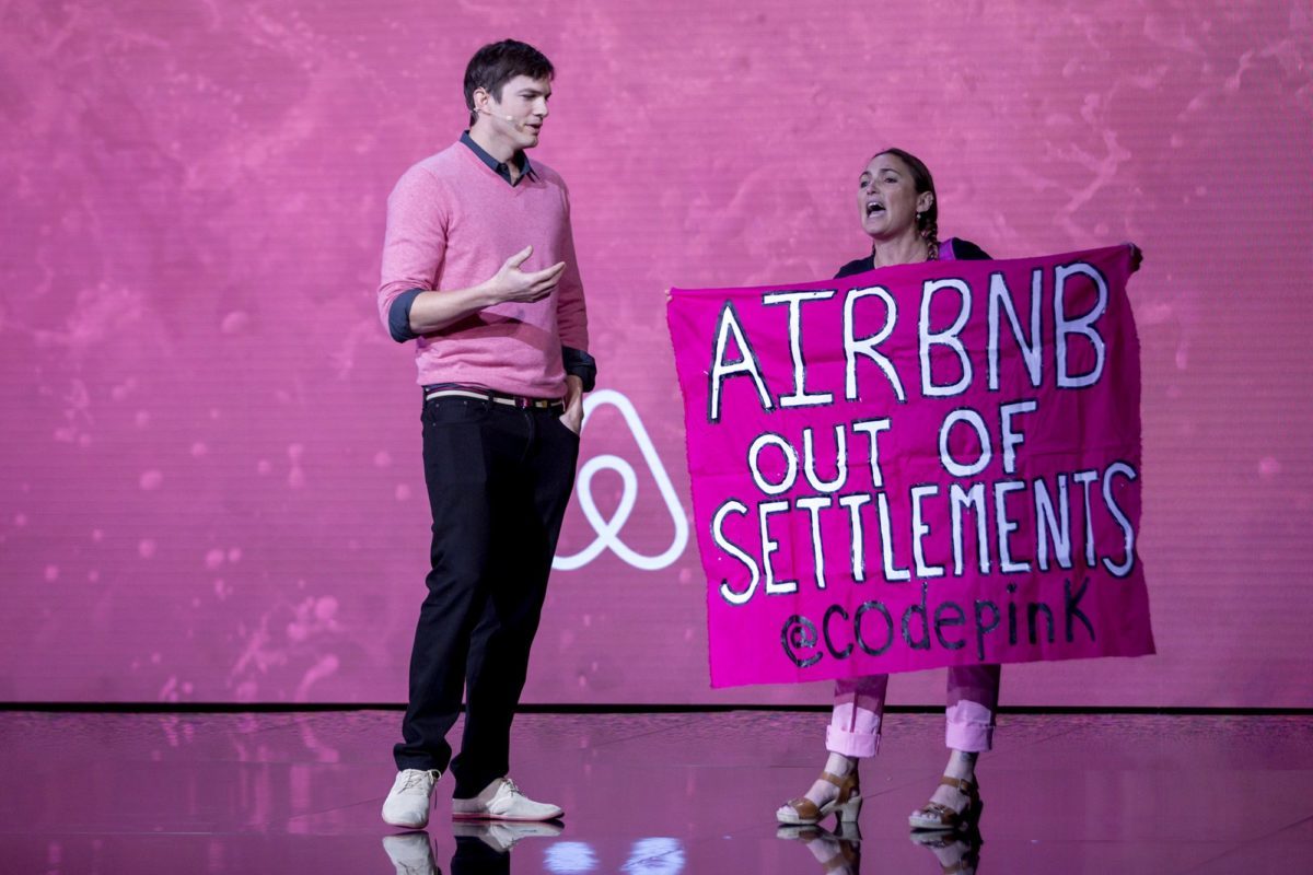 Ariel Gold disrupts Ashton Kutcher's Airbnb presentation.