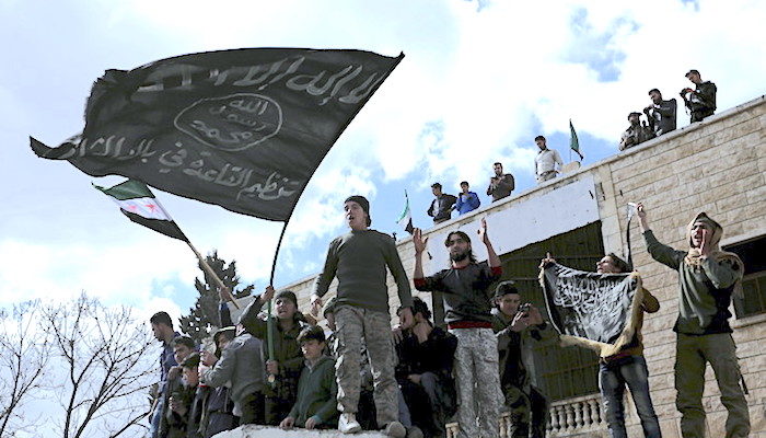 Al-Qaeda flag and guys