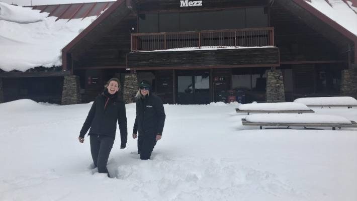Cardrona skifield staff members Kay Gall and Tessa Cross standing in the courtyard on November 22.